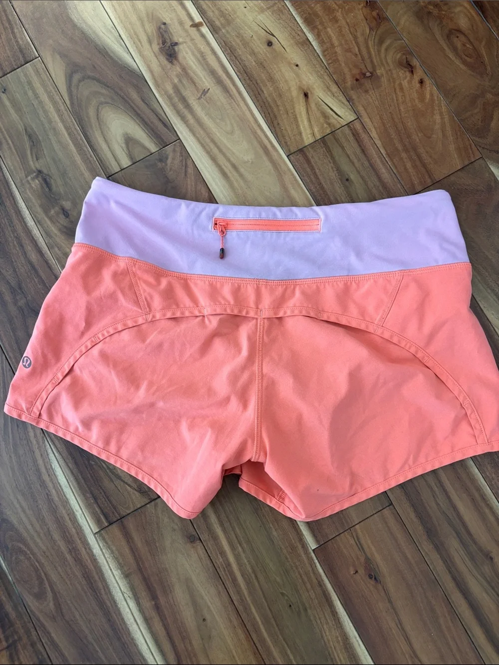 Discontinued lululemon athletica Coral Shorts with Light Pink Waistband